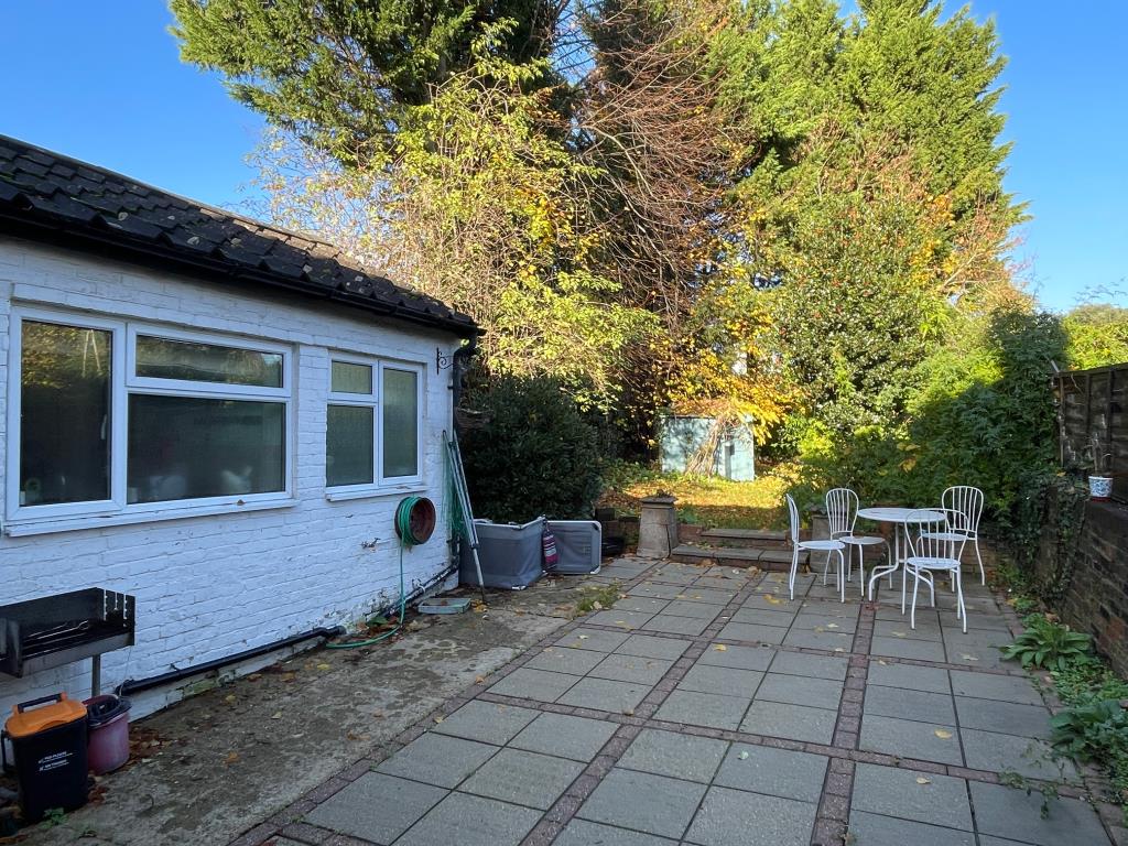 Lot: 132 - ATTRACTIVE HOUSE FOR IMPROVEMENT - Rear patio for house for refurbishment